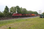 A CPKC train coming through Westfield NY on CSX tracks